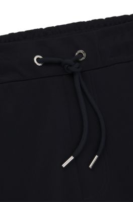 Pantalones de ch&aacute;ndal Porsche x BOSS con detalles de costuras, Azul oscuro