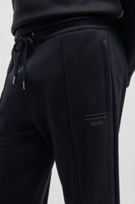 Pantalones de ch&aacute;ndal Porsche x BOSS con detalles de costuras, Azul oscuro