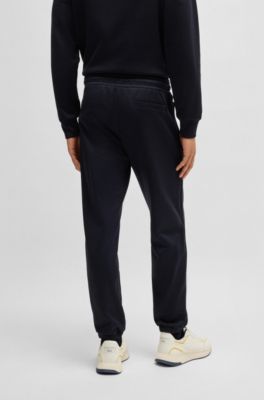 Pantalones de ch&aacute;ndal Porsche x BOSS con detalles de costuras, Azul oscuro