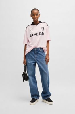 Football-inspired mesh T-shirt with Happy HUGO logo, light pink
