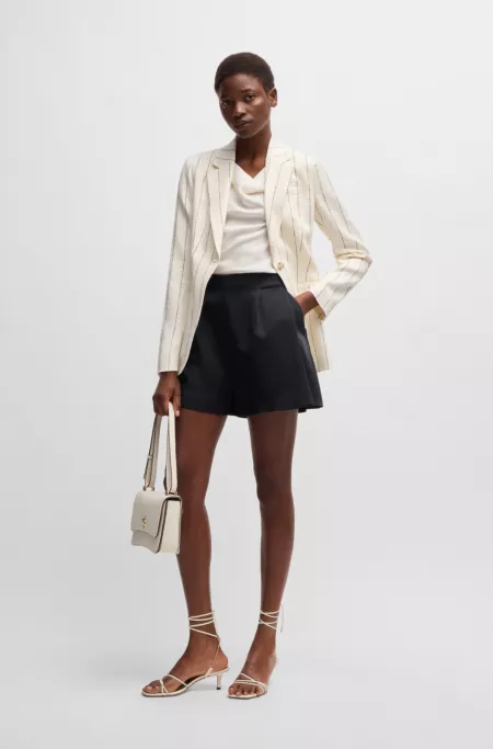 Relaxed-fit shorts with front pleats