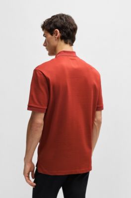 Polo shirt with seersucker structure, Dark Orange