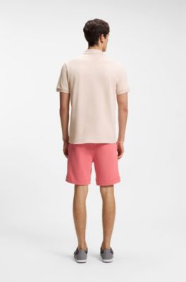 Polo slim fit de algod&oacute;n el&aacute;stico con parche de logo, Rosa claro