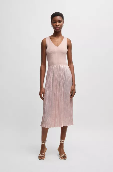 Knitted dress with lustrous structured skirt