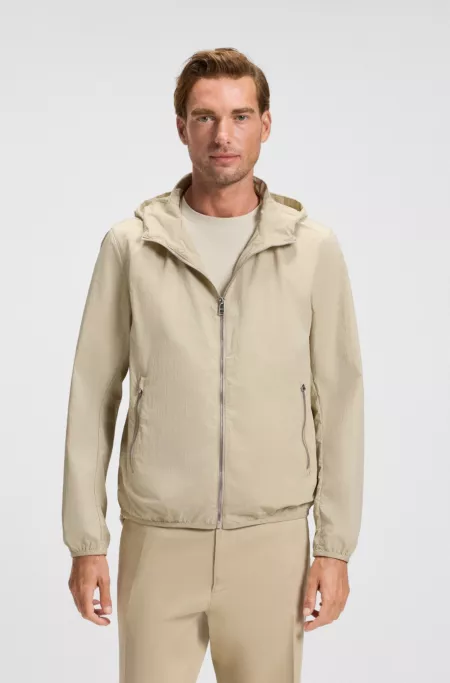 Water-repellent jacket in crinkle fabric with adjustable hood