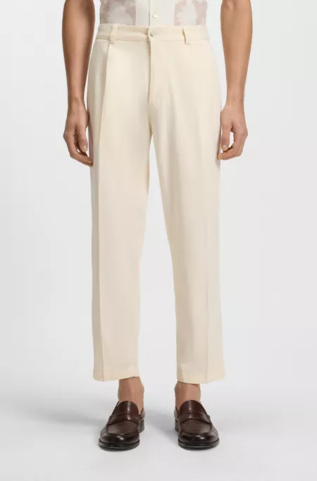 Tapered-fit trousers in stretch twill