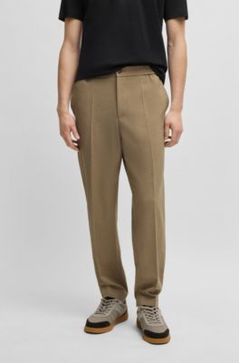 Pantalones slim fit en tejido jaspeado resistente a las arrugas, Marr&oacute;n