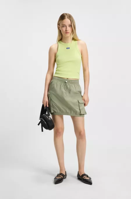 Mini skirt in paper-touch cotton with cargo pockets