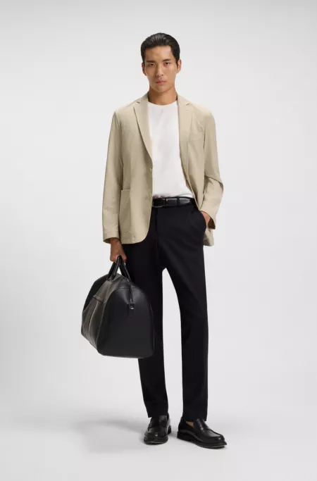 Slim-fit suit jacket in travel-friendly stretch softshell