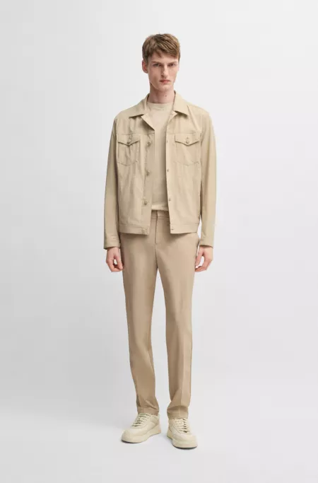 Slim-fit trousers in travel-friendly stretch softshell fabric