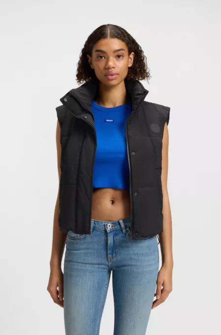 Water-repellent gilet with Happy HUGO badge