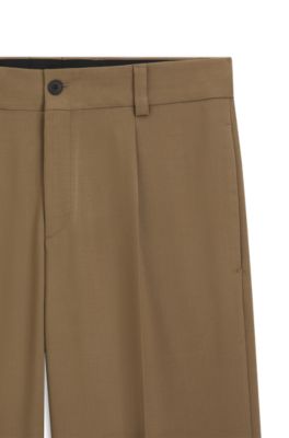 Pantalones de corte moderno en sarga el&aacute;stica con raya delantera, Desbordamiento de color beige