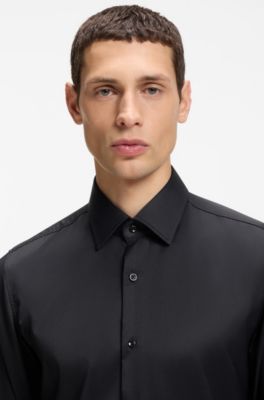 Camisa slim fit en sarga el&aacute;stica t&eacute;cnica, Negro
