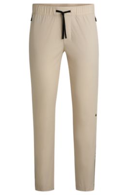BOSS - Active trousers with four-way stretch - Light Beige