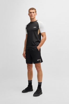 Camiseta deportiva con bloques de color en tejido que absorbe la humedad, Negro