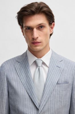 Cravate en soie italienne &agrave; rayures en diagonale, bleu clair