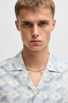 Camisa relaxed fit en algod&oacute;n con logo geom&eacute;trico estampado, Celeste