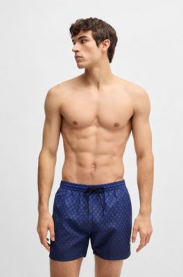 Printed swim shorts with logo detail