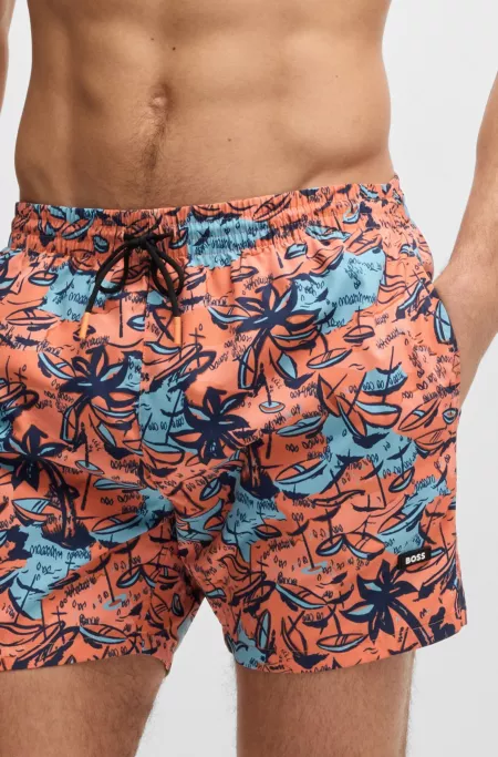 Printed swim shorts with logo detail