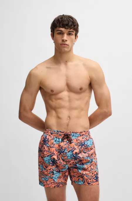 Printed swim shorts with logo detail