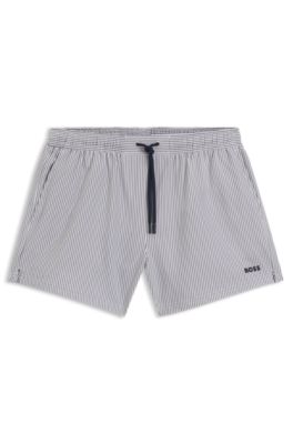 Embroidered-logo swim shorts in striped seersucker, Dark Blue