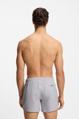 Embroidered-logo swim shorts in striped seersucker, Dark Blue