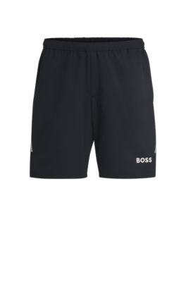 Short de tennis au style actif en stretch extensible, Bleu fonc&eacute;