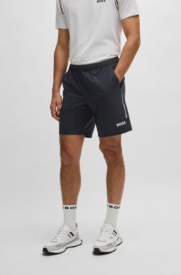 Short de tennis au style actif en stretch extensible, Bleu fonc&eacute;