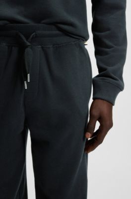 Cotton-terry tracksuit bottoms with embroidered logo, Black