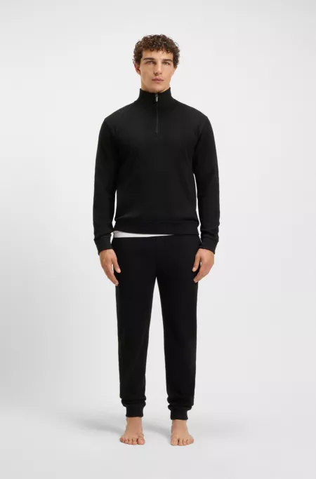 Waffle-structure tracksuit bottoms in a cotton blend