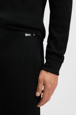 Pantalones de ch&aacute;ndal en mezcla de algod&oacute;n con estructura de rejilla, Negro