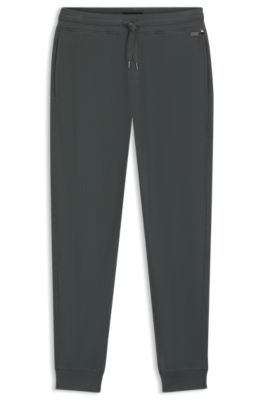 Waffle-structure tracksuit bottoms in a cotton blend, Light Green