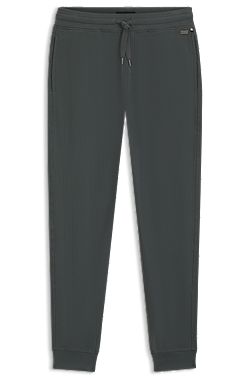 Pantalones de chándal en mezcla de algodón con estructura de rejilla