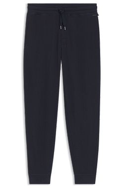 Pantalones de chándal en mezcla de algodón con estructura de rejilla