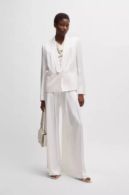 Relaxed-fit trousers with front pleats