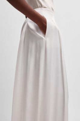 Relaxed-fit trousers with front pleats, White