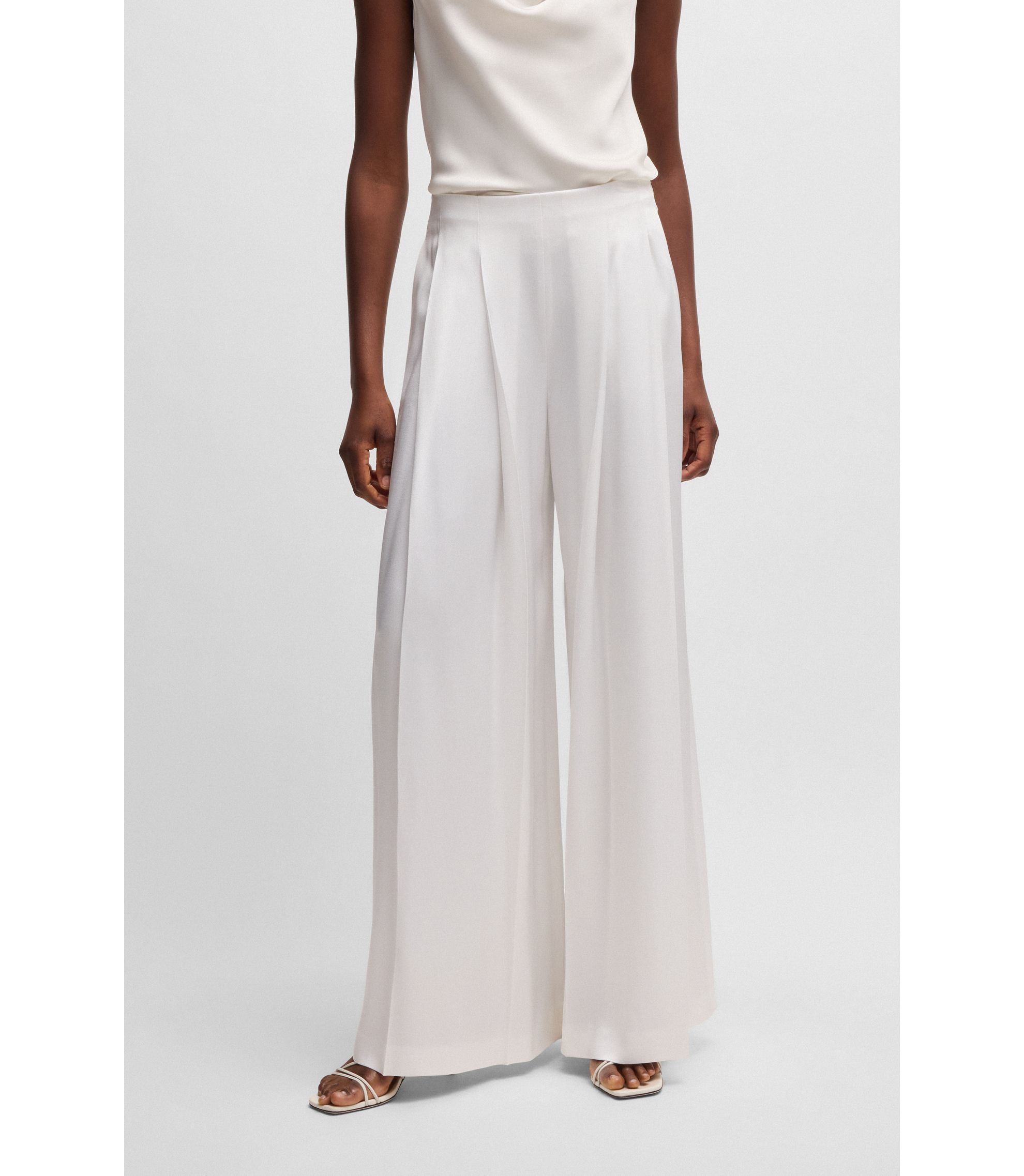 BOSS - Relaxed-fit trousers with front pleats - White