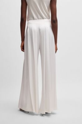 Relaxed-fit trousers with front pleats, White