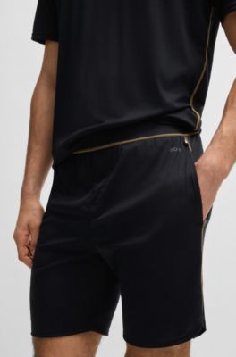 Pijama de punto el&aacute;stico con pespuntes, Negro