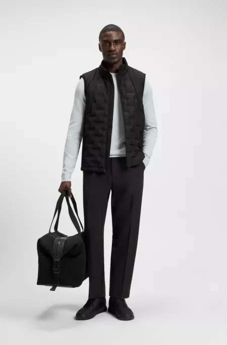 Down-filled gilet with welded-logo pattern