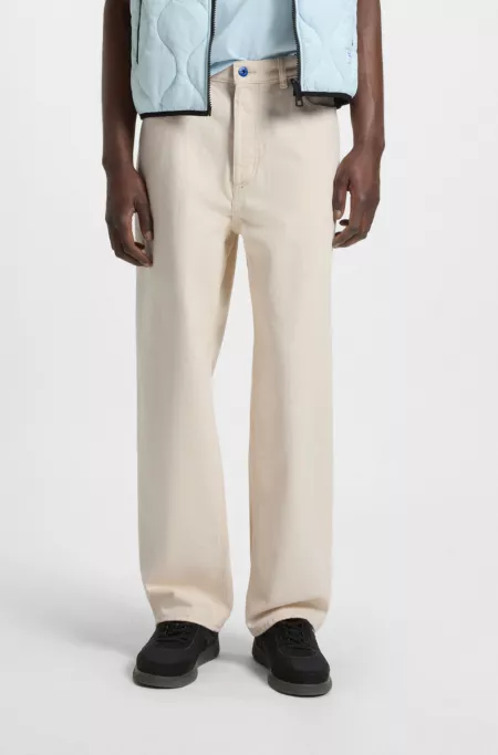 Straight-fit jeans in ecru denim with carpenter pocket