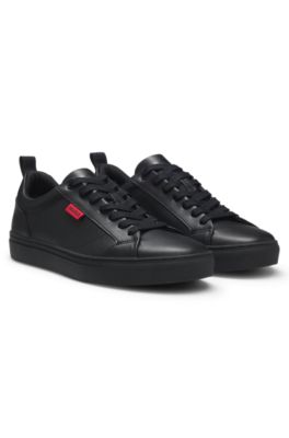 HUGO - Faux-leather trainers with red logo flag - Black