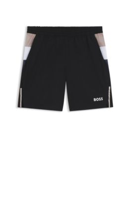 Short de tennis Actif en tissu stretch avec gestion de l&rsquo;humidit&eacute;, Noir