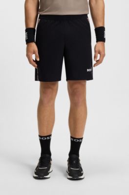 Short de tennis Actif en tissu stretch avec gestion de l&rsquo;humidit&eacute;, Noir