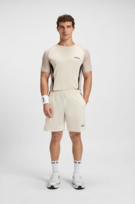 Short de tennis Actif en tissu stretch avec gestion de l&rsquo;humidit&eacute;, Blanc