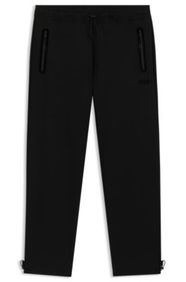 Pantalones regular fit de tejido de sarga con el&aacute;stico, Negro