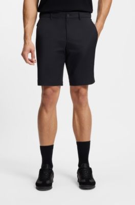 Shorts repelentes al agua con acabado de planchado f&aacute;cil, Negro