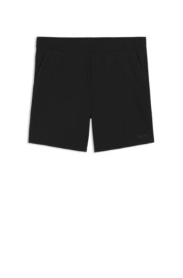 Shorts deportivos de doble capa en tejido de secado r&aacute;pido, Negro