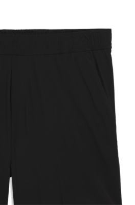 Shorts deportivos de doble capa en tejido de secado r&aacute;pido, Negro