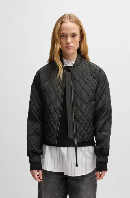 Quilted bomber jacket with ribbon zip-puller